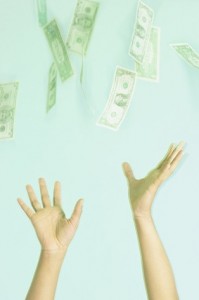 hands chasing money